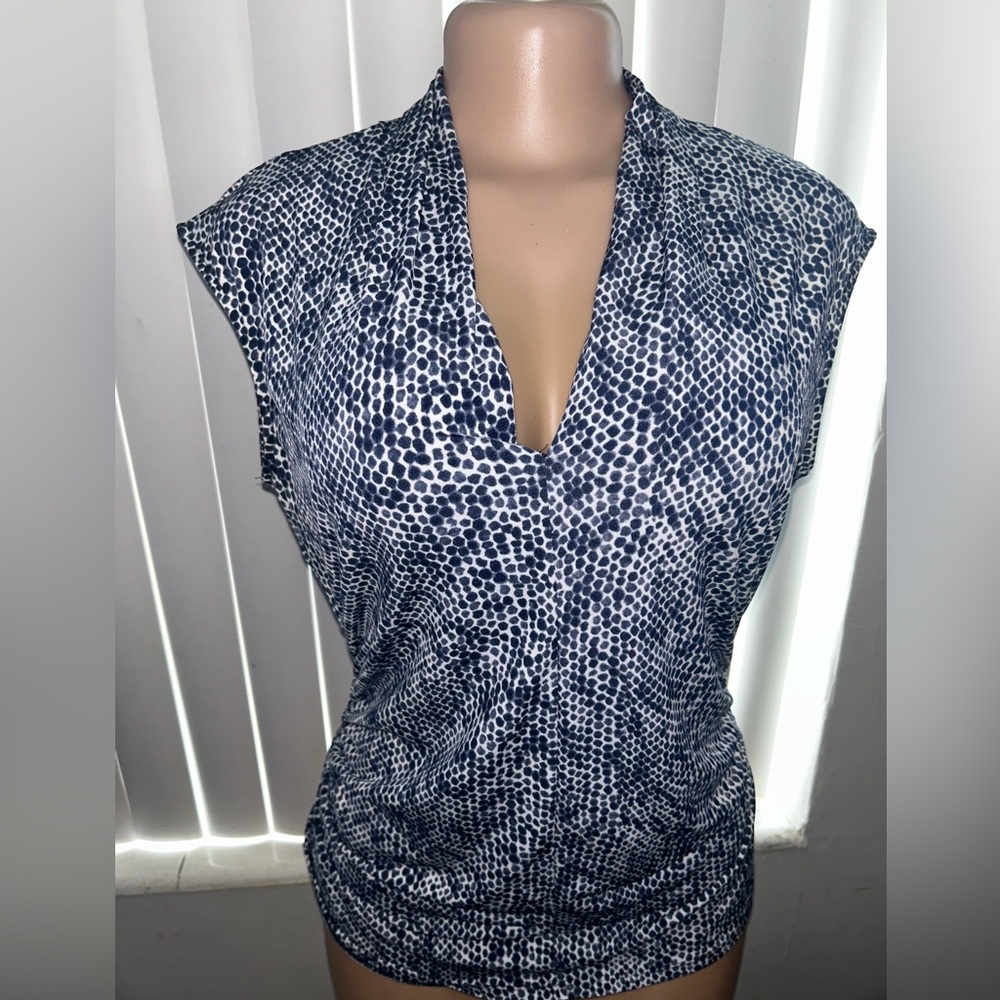 Women’s Vince Camuto top in the color blue/white in a size Large